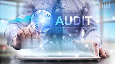 Man using audit technology to improve data quality
