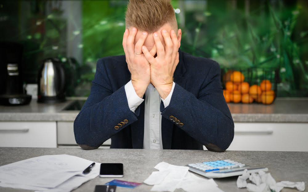 Desperate business owner struggling to handle late or missed payments